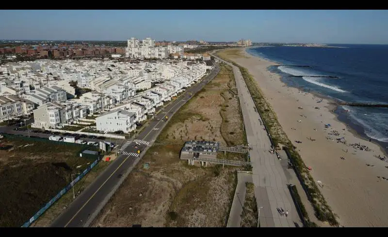 Photo de Rockaway Park Beach avec sable beige de surface