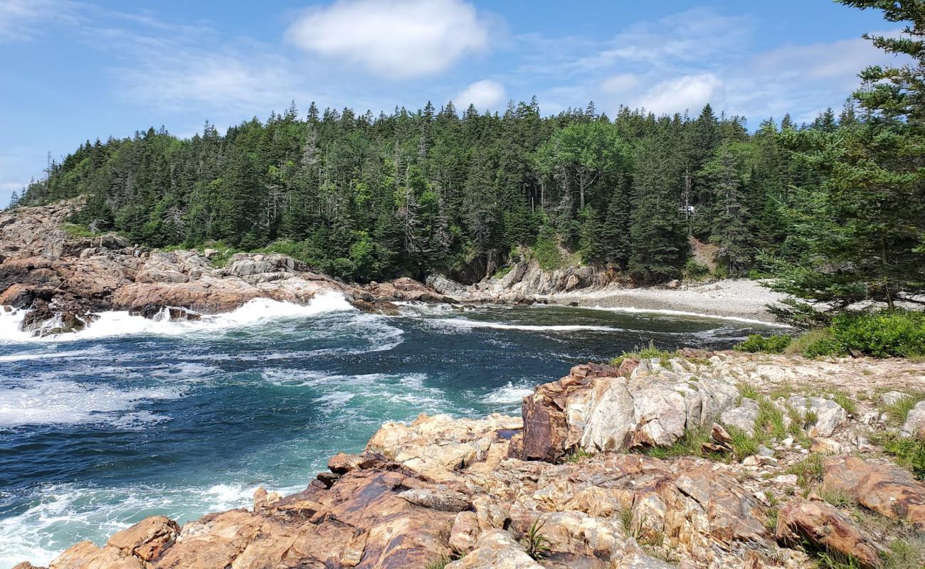 Photo de Plage des Hunters avec roches de surface