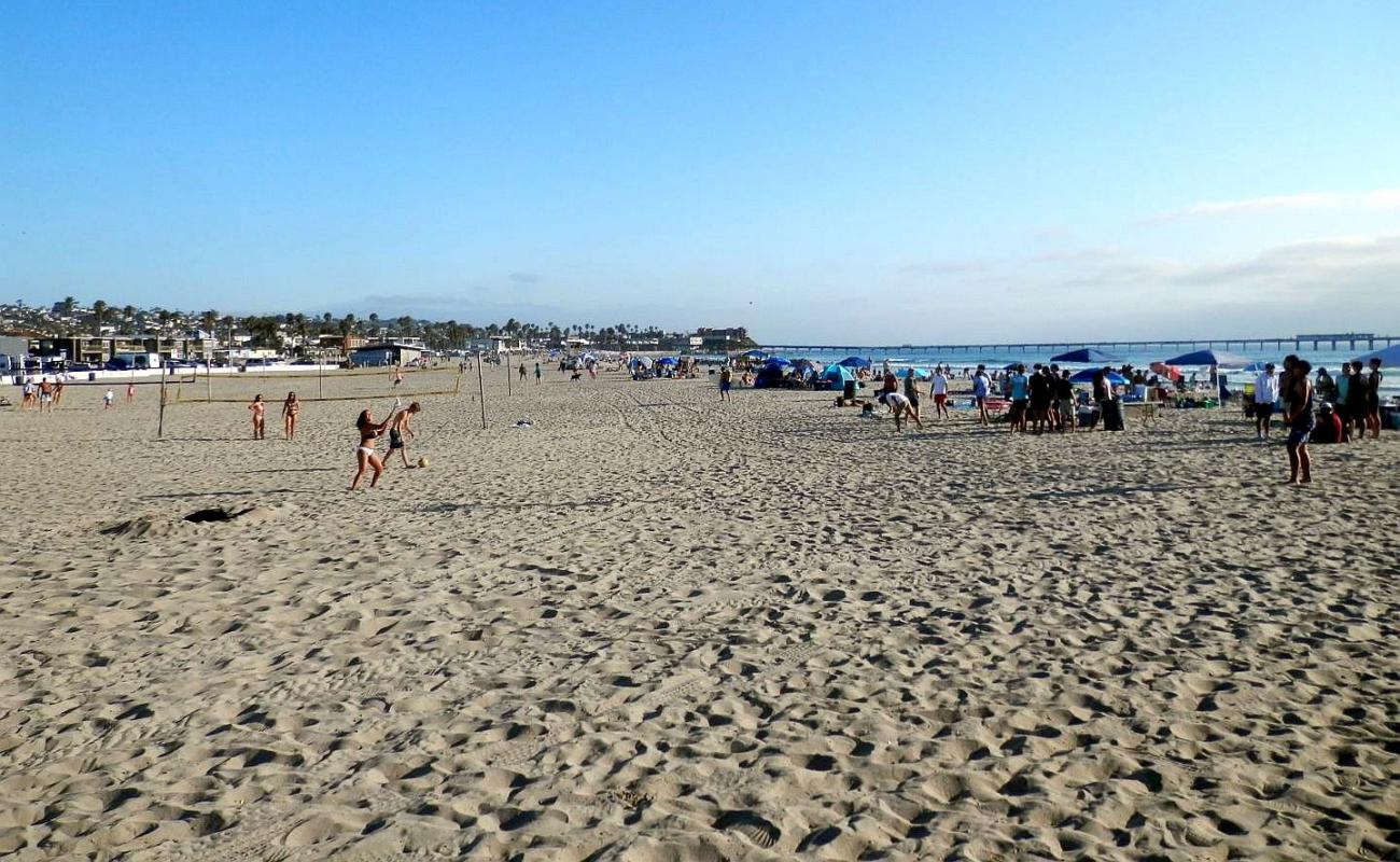 Photo de Ocean beach avec sable beige de surface