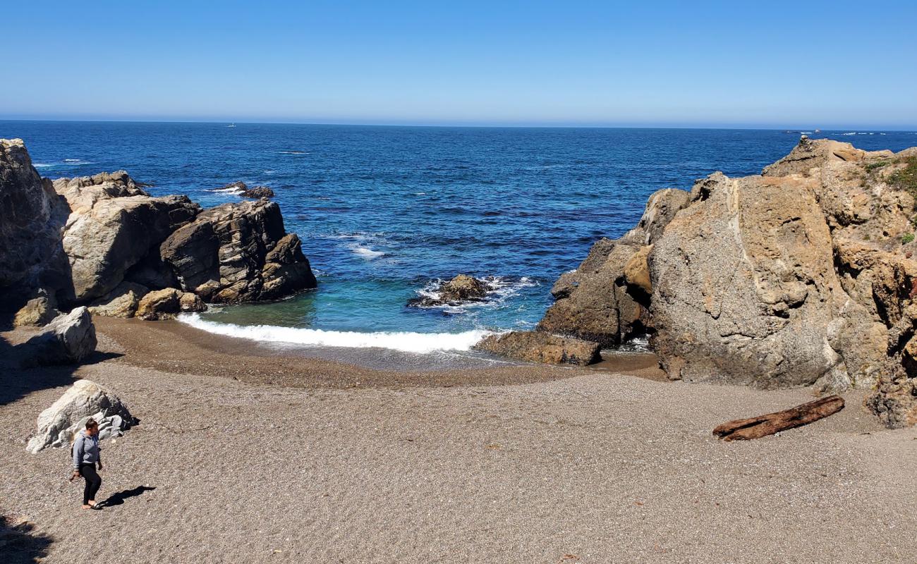 Photo de Hidden Beach avec petits galets beige de surface