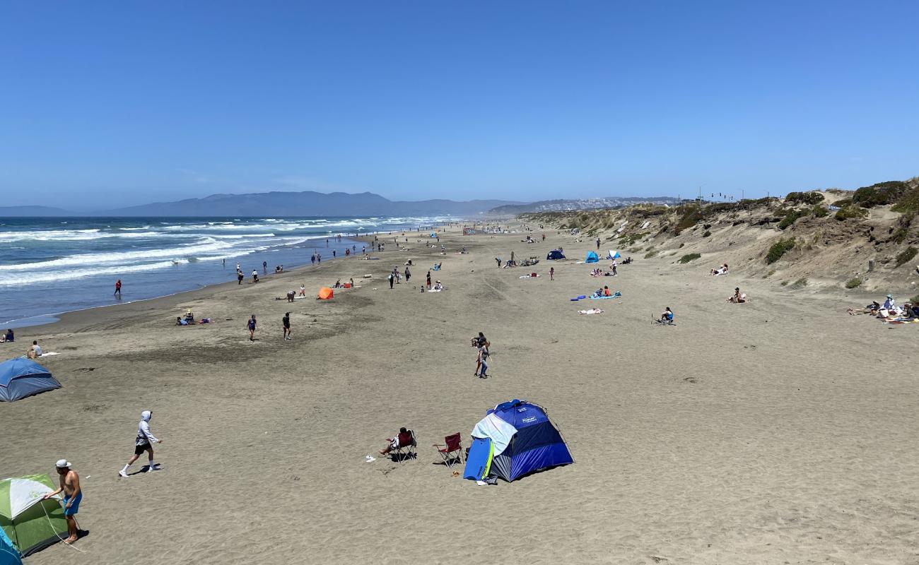 Photo de Ocean Beach avec sable beige de surface