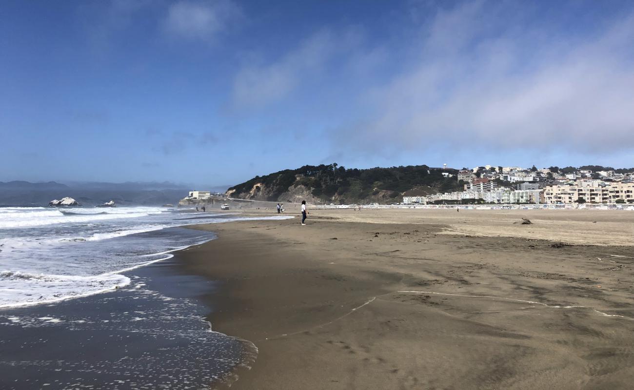 Photo de Ocean Beach III avec sable beige fin de surface