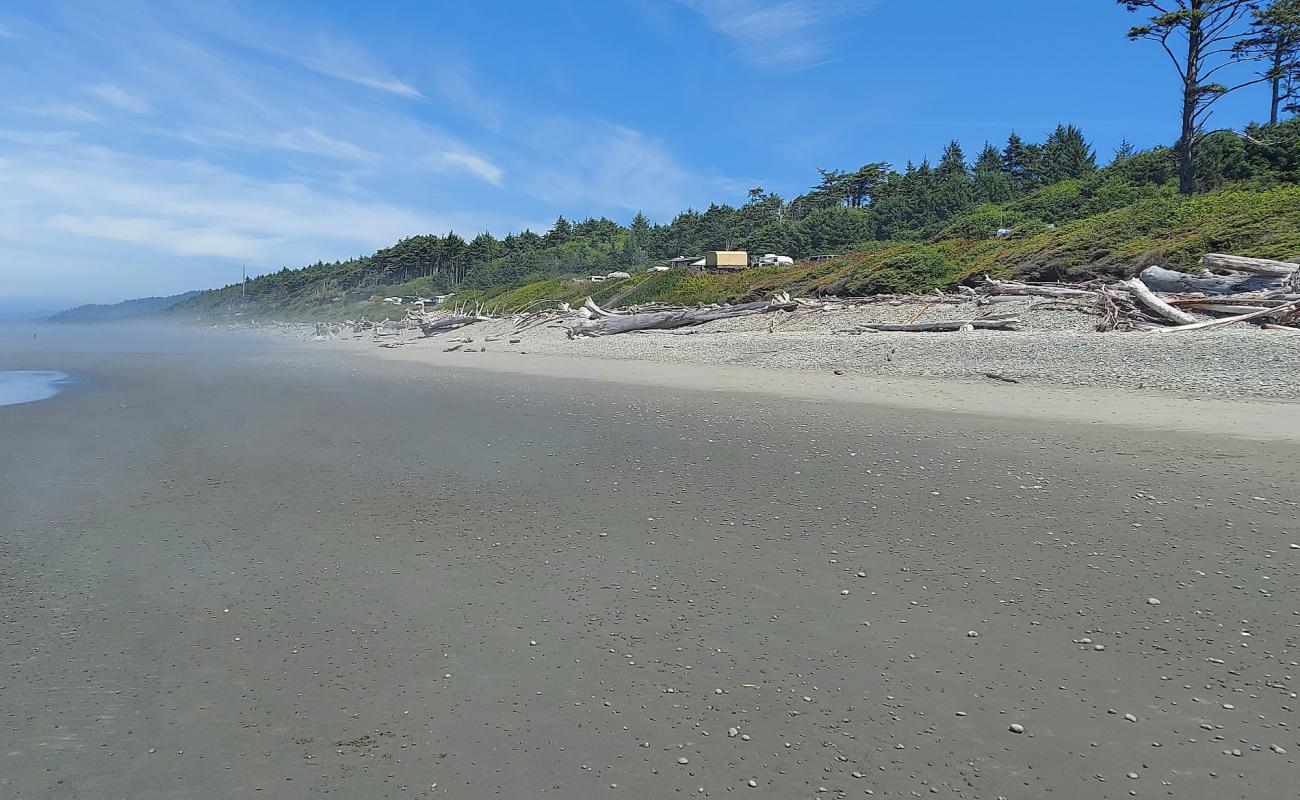 Photo de South Beach avec sable beige & galets de surface