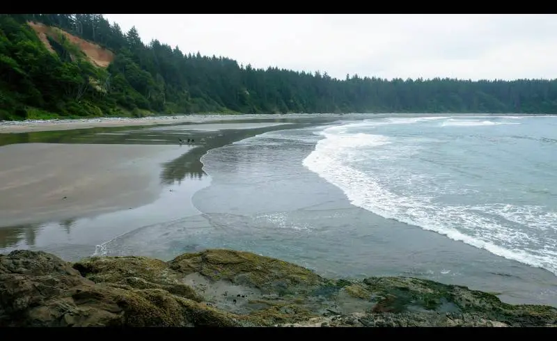 Photo de Yellow Banks Beach avec sable beige & pierres de surface