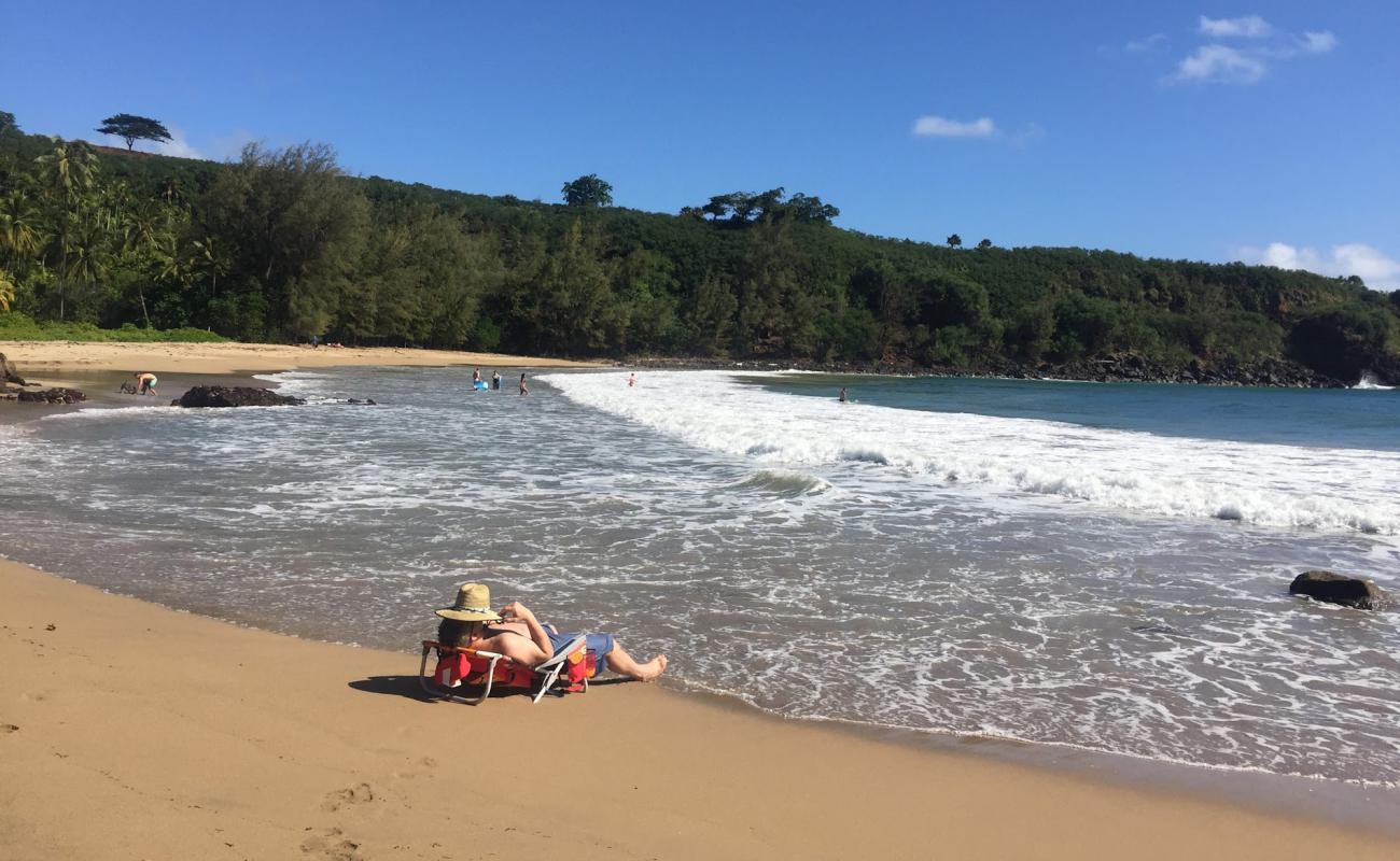 Photo de Ka Lae O Kaiwa Beach avec sable lumineux de surface