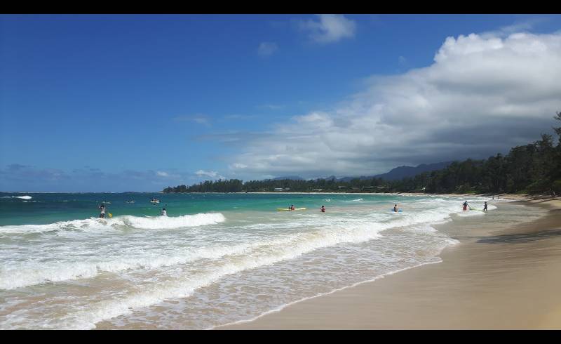 Photo de Moku'Auia Beach avec sable lumineux de surface