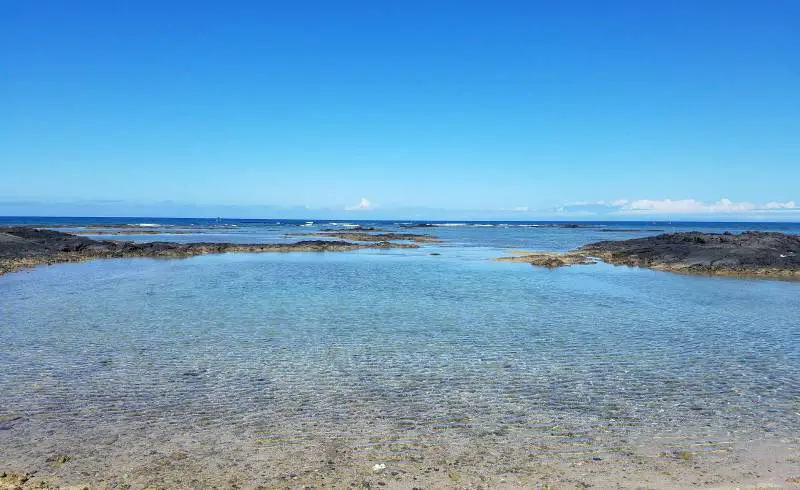 Photo de Mauna Lani Beach avec sable lumineux de surface