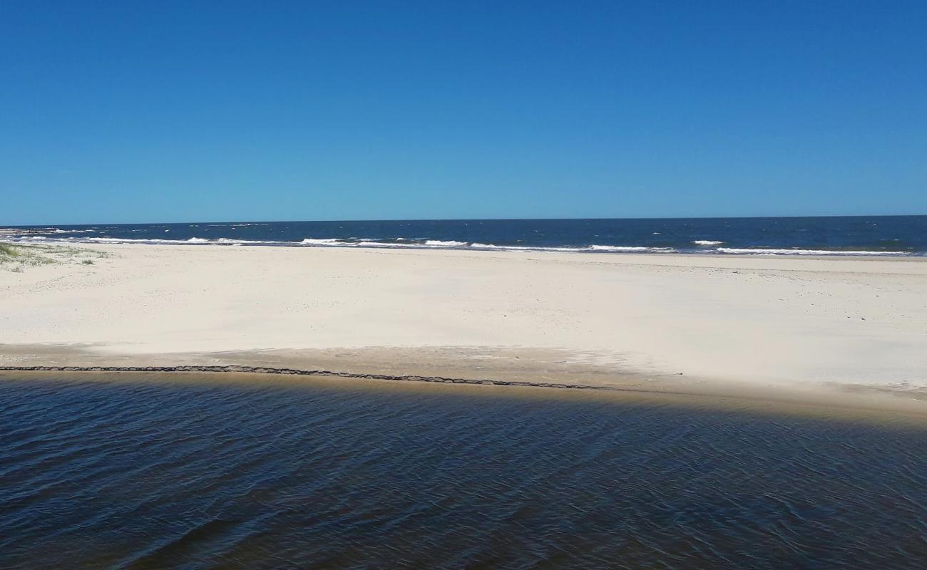 Photo de San Antonio Beach avec sable beige de surface