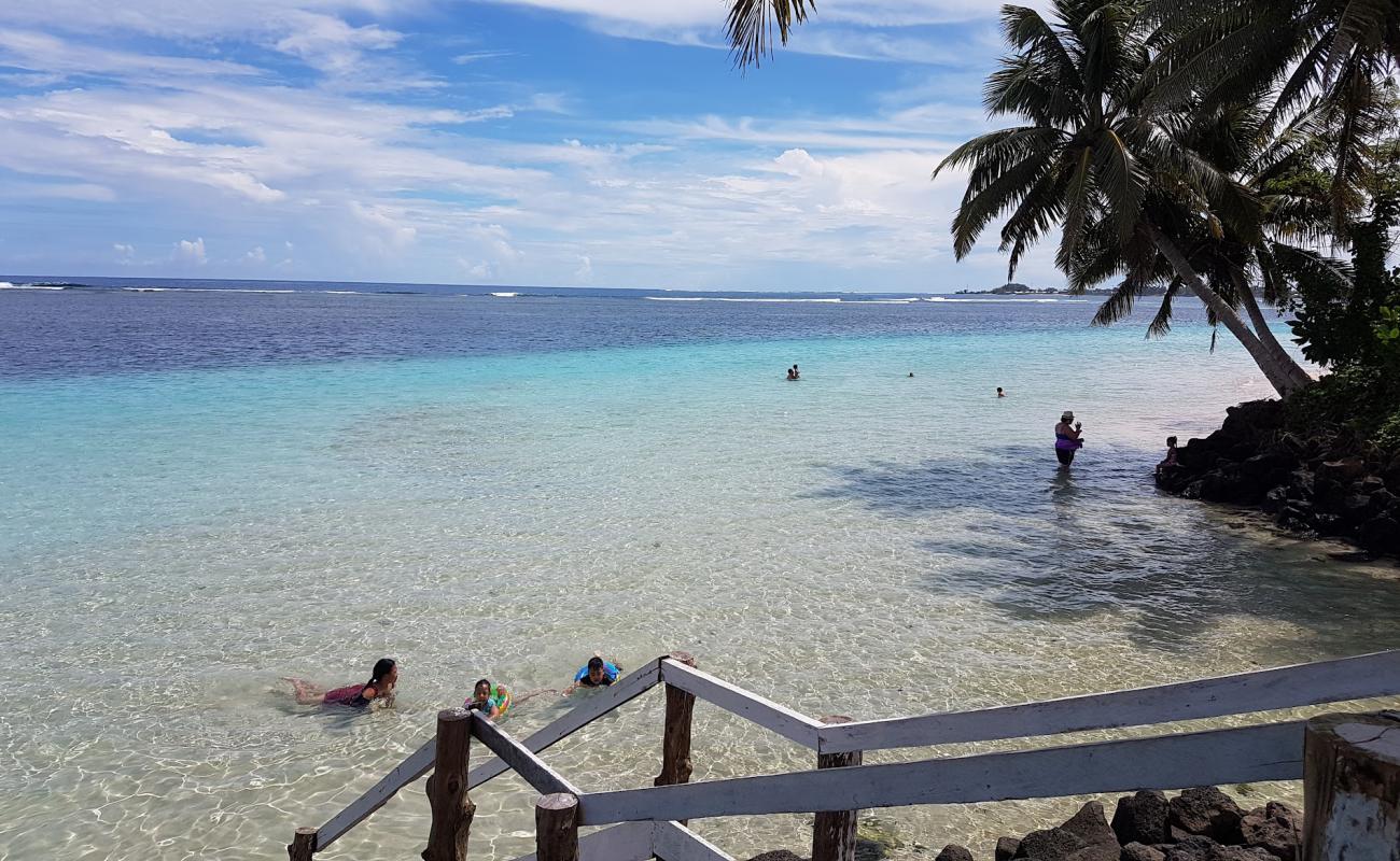 Photo de Tanu Beach avec sable beige de surface