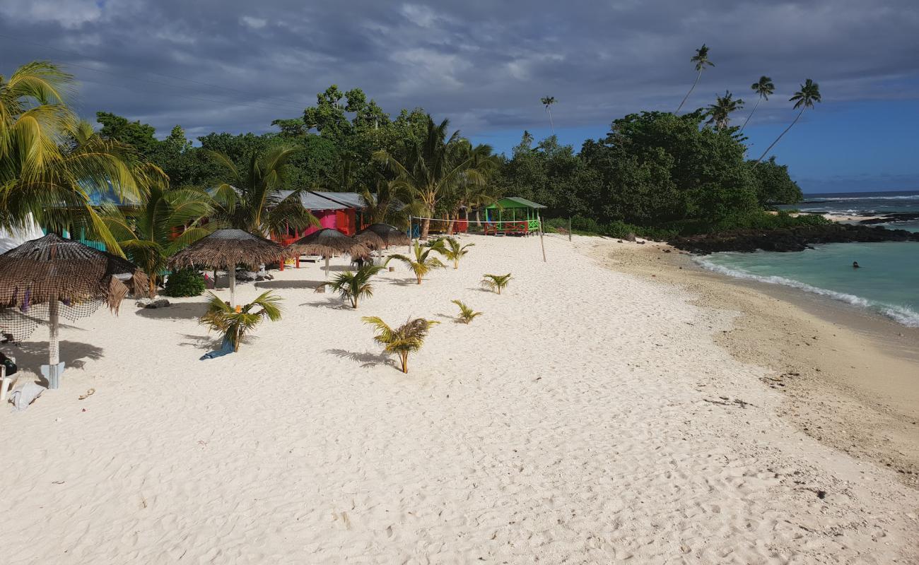 Photo de Faimafili Village Beach avec sable beige de surface