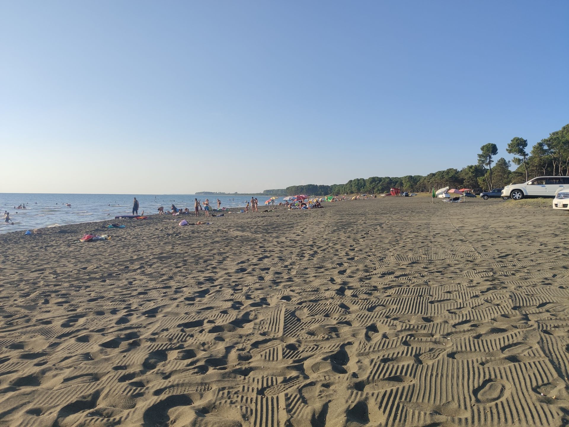 Photo de Ureki Nature beach avec sable noir de surface