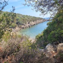 Photo de Marathi III beach avec l'eau cristalline de surface